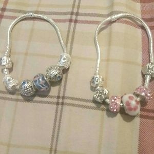 Authentic Pandora bracelets with charms.